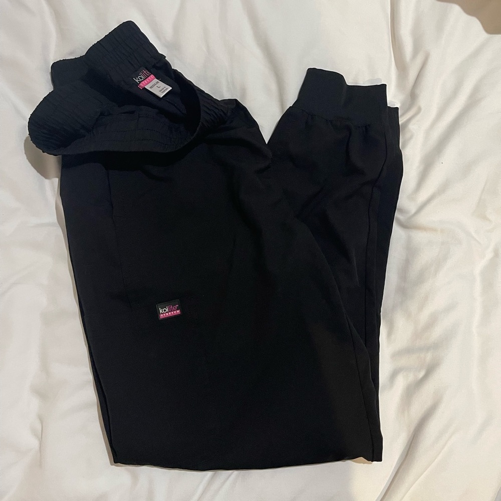 Koi jogger scrub pants , black with pink detail , size large